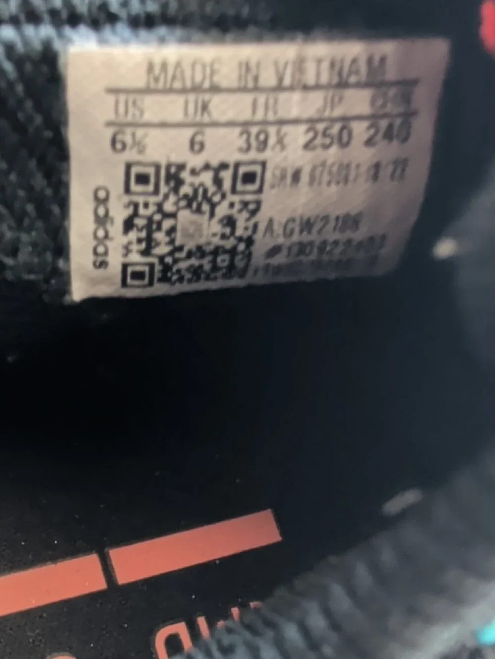 adidas Kids Black PrimeKnit Sneakers with Orange and Teal Accents GW2186 NMD S1